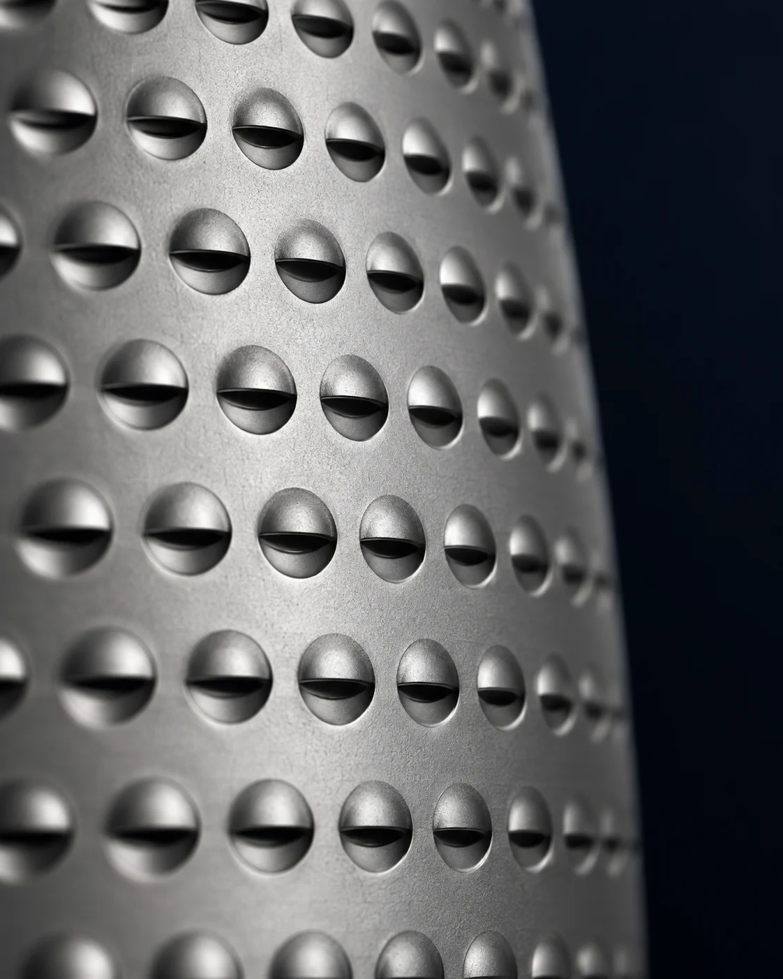 Close-up of the dimples on Purispira Pro, each with a small louvre over a slot